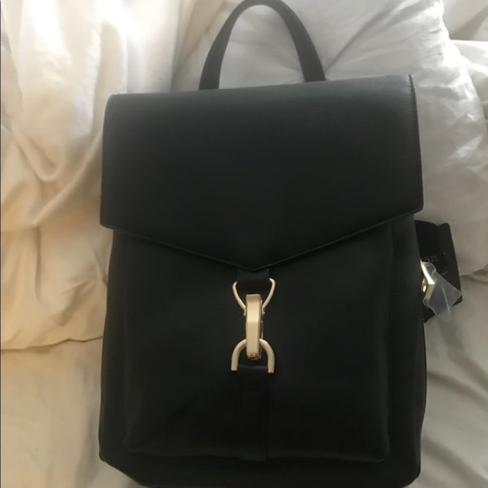 Lionel black back pack purse